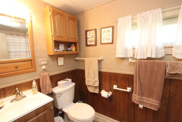 9701 Illinois St, Hebron, IL 60034 - bathroom featuring vanity, a wainscoted wall, and wood walls