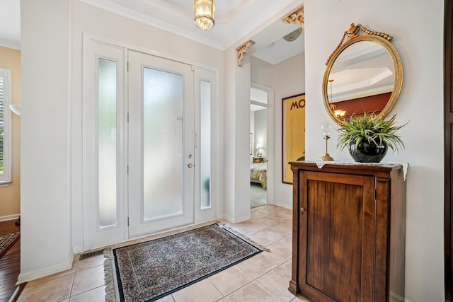 12663 Cold Springs Dr, Huntley, IL 60142 - foyer featuring crown molding and light tile patterned flooring