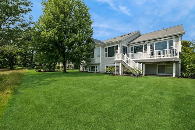 12663 Cold Springs Dr, Huntley, IL 60142 - back of house featuring a wooden deck, stairway, and a yard
