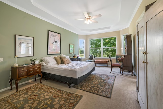 12663 Cold Springs Dr, Huntley, IL 60142 - carpeted bedroom with a tray ceiling, ornamental molding, and ceiling fan