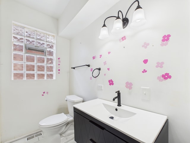 8015 S Paxton Ave, Chicago, IL 60617 - half bathroom featuring vanity and toilet