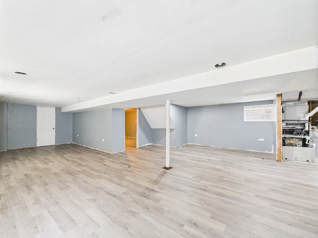 8015 S Paxton Ave, Chicago, IL 60617 - below grade area with light wood-type flooring