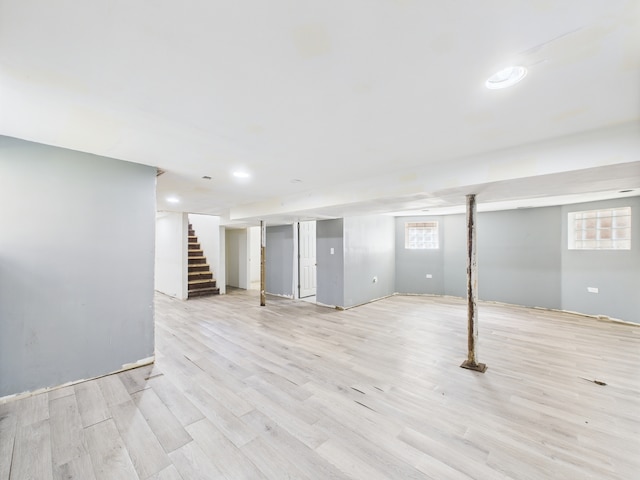 8015 S Paxton Ave, Chicago, IL 60617 - below grade area with stairs and light wood-style floors