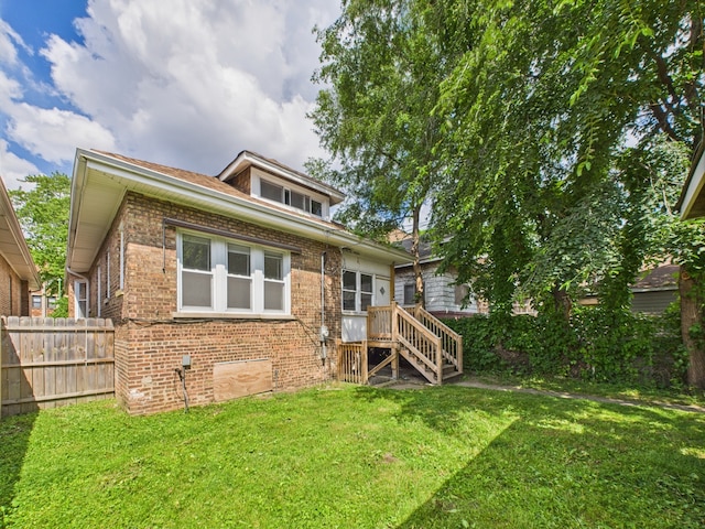 8015 S Paxton Ave, Chicago, IL 60617 - rear view of house featuring brick siding