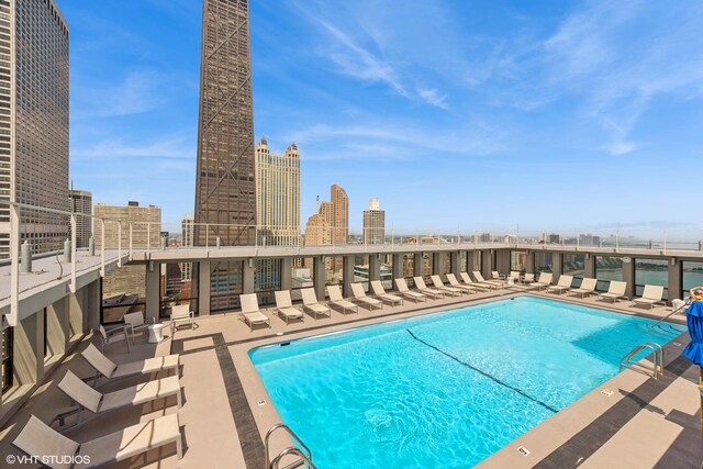 260 E Chestnut St Unit 3303, Chicago, IL 60611 - community pool featuring a patio and a city view