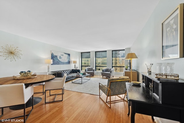 260 E Chestnut St Unit 3303, Chicago, IL 60611 - living room with light wood-style floors and expansive windows