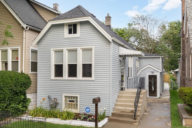 12349 S Parnell Ave, Chicago, IL 60628 - view of front facade with a chimney