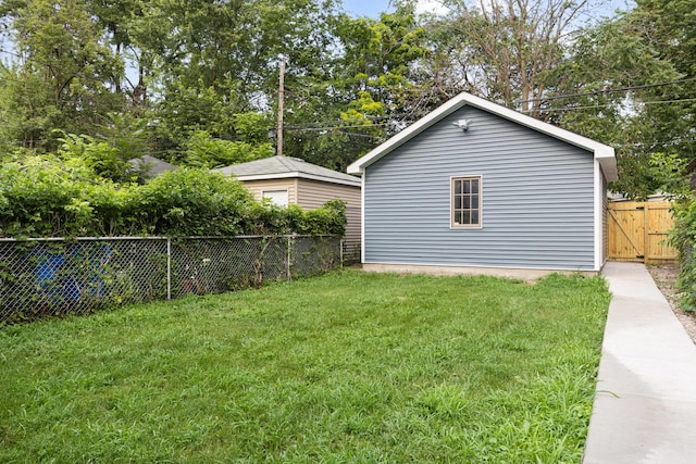12349 S Parnell Ave, Chicago, IL 60628 - view of home's exterior featuring a fenced backyard