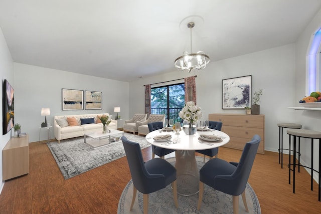 5200 N Rockwell St Unit 3N, Chicago, IL 60625 - dining room with a chandelier and wood finished floors