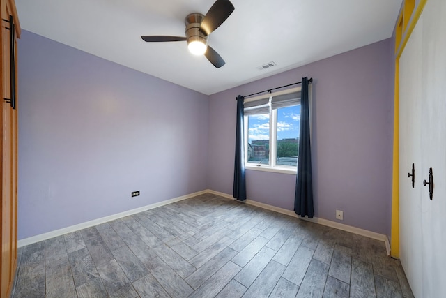 5200 N Rockwell St Unit 3N, Chicago, IL 60625 - spare room featuring a ceiling fan and wood finished floors