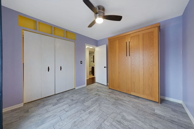 5200 N Rockwell St Unit 3N, Chicago, IL 60625 - unfurnished bedroom with light wood finished floors, a ceiling fan, and a closet