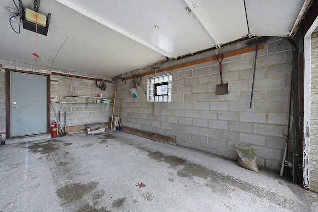 5200 N Rockwell St Unit 3N, Chicago, IL 60625 - garage with a garage door opener and concrete block wall