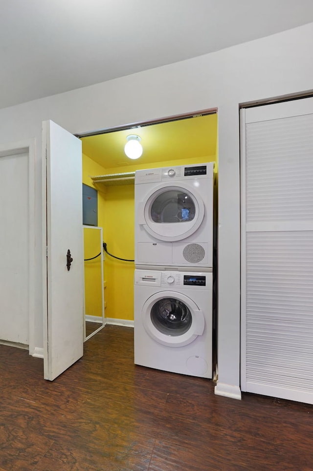 5200 N Rockwell St Unit 3N, Chicago, IL 60625 - washroom featuring stacked washer / drying machine and dark wood-type flooring