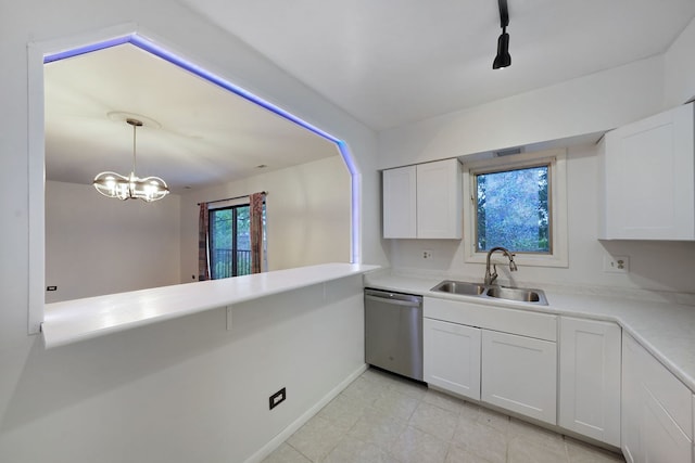 5200 N Rockwell St Unit 3N, Chicago, IL 60625 - kitchen with stainless steel dishwasher, white cabinets, light countertops, decorative light fixtures, and a chandelier