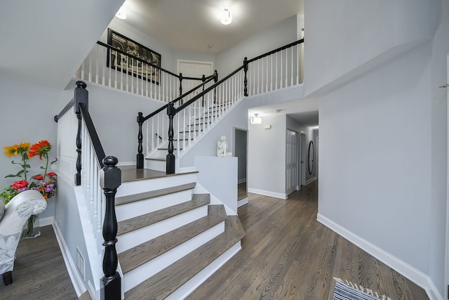 3142 Bennett Pl, Aurora, IL 60502 - stairway with wood finished floors and a high ceiling