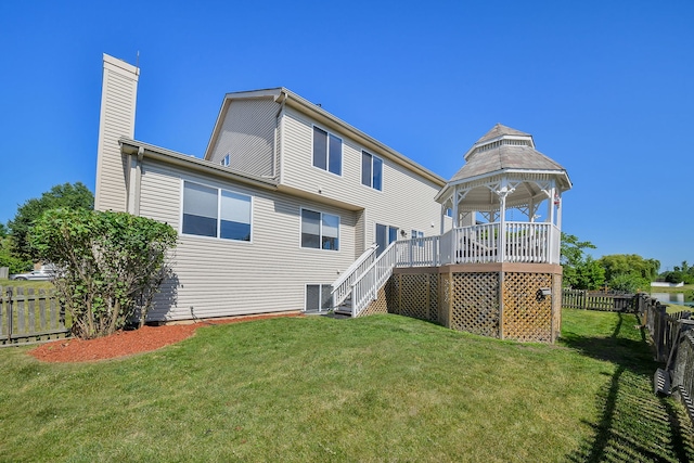 3142 Bennett Pl, Aurora, IL 60502 - rear view of property featuring a chimney, stairway, and a gazebo