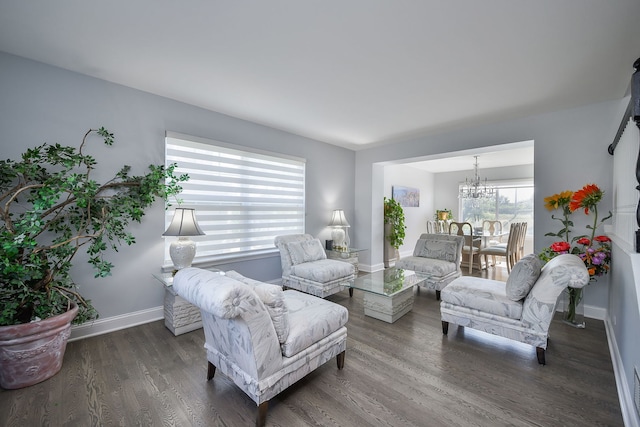 3142 Bennett Pl, Aurora, IL 60502 - living area with a chandelier and wood finished floors