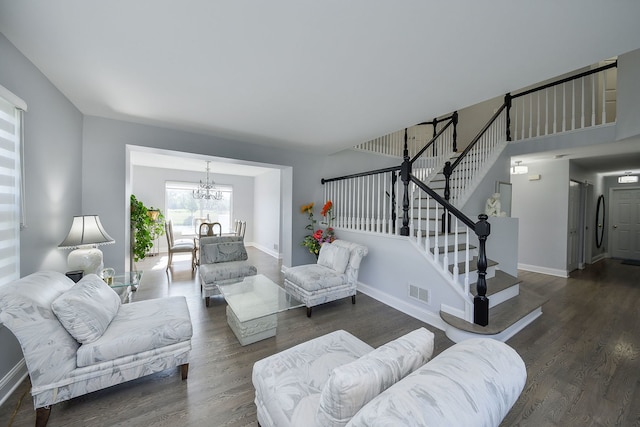 3142 Bennett Pl, Aurora, IL 60502 - living area with wood finished floors, a chandelier, and stairway