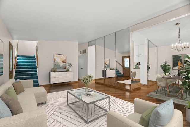 806 Lawler Ave, Wilmette, IL 60091 - living room featuring stairs, a chandelier, and wood finished floors