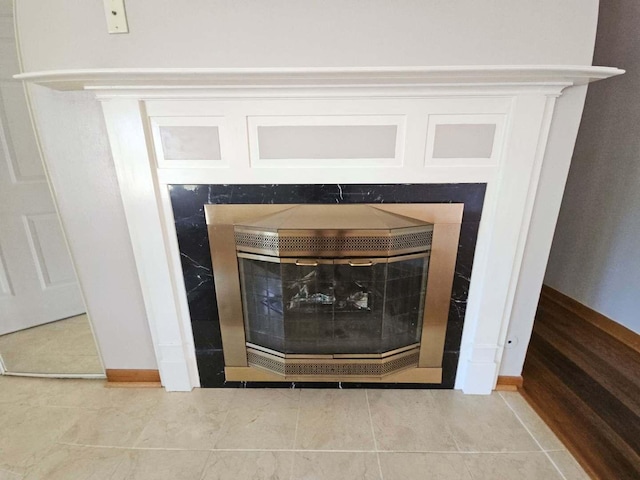 75 Bode Rd, Hoffman Estates, IL 60169 - detailed view of baseboards and a tiled fireplace