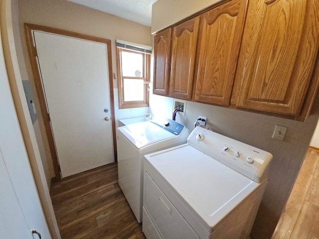75 Bode Rd, Hoffman Estates, IL 60169 - laundry room featuring washing machine and clothes dryer, wood finished floors, and cabinet space