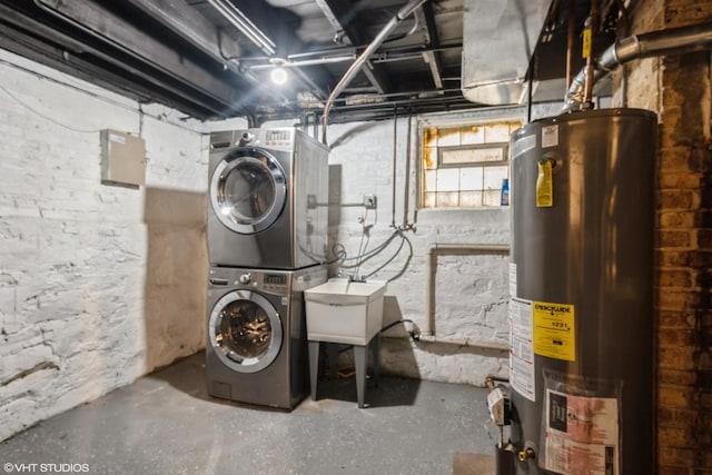 7226 S Rhodes Ave, Chicago, IL 60619 - basement featuring water heater and stacked washer and clothes dryer
