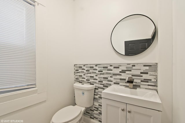 7226 S Rhodes Ave, Chicago, IL 60619 - bathroom with vanity, decorative backsplash, and tile walls