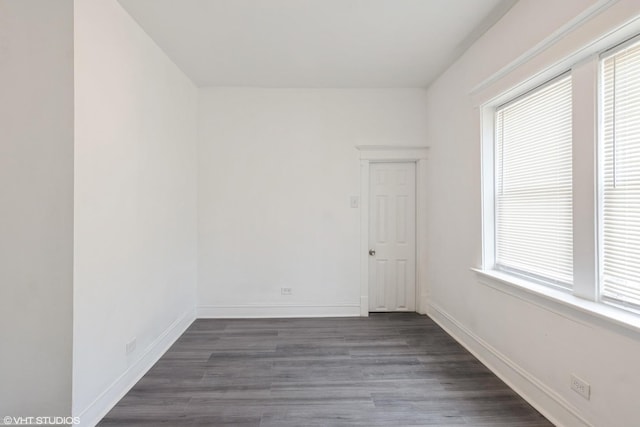 7226 S Rhodes Ave, Chicago, IL 60619 - unfurnished room with dark wood-style floors and baseboards