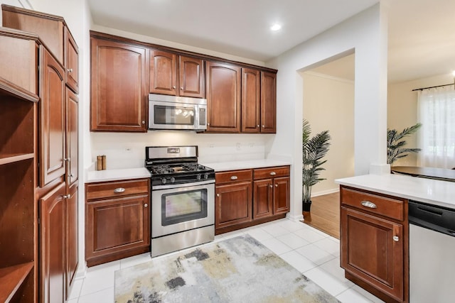 2302 Sandy Creek Dr, Algonquin, IL 60102 - kitchen featuring stainless steel appliances, light tile patterned floors, light countertops, recessed lighting, and open shelves