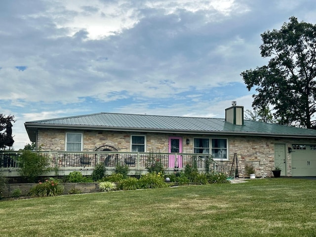 6119 Little Galilee Rd, Clinton, IL 61727 - view of front of home with stone siding, a metal roof, a chimney, and a front yard