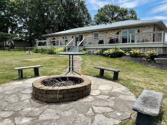 6119 Little Galilee Rd, Clinton, IL 61727 - view of patio / terrace with an outdoor fire pit and a deck