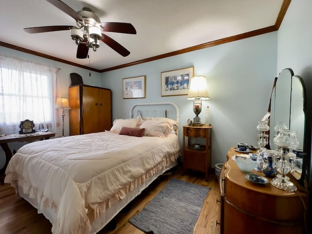 6119 Little Galilee Rd, Clinton, IL 61727 - bedroom with crown molding, wood finished floors, and a ceiling fan