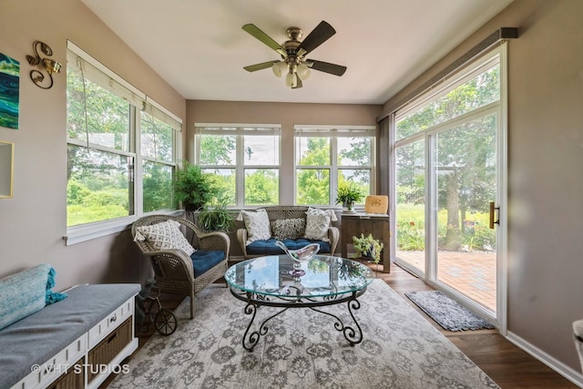 1550 W Ludington Cir, Romeoville, IL 60446 - sunroom / solarium with healthy amount of natural light and wood finished floors