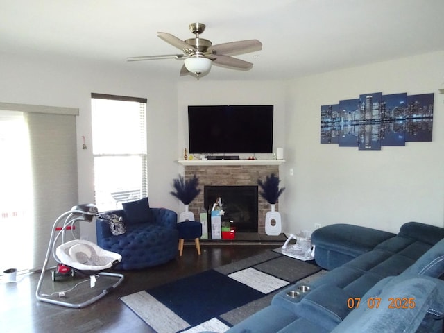 1108 Evergreen Ave, Des Plaines, IL 60016 - living area with ceiling fan, a fireplace, and wood finished floors