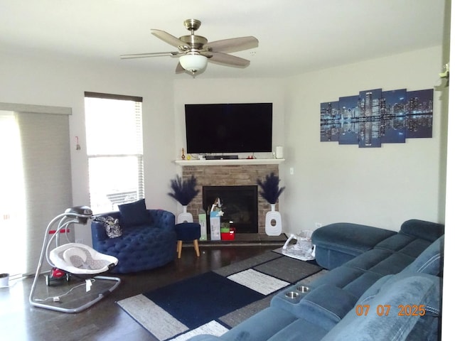 1108 Evergreen Ave, Des Plaines, IL 60016 - living room with wood finished floors, a ceiling fan, and a fireplace