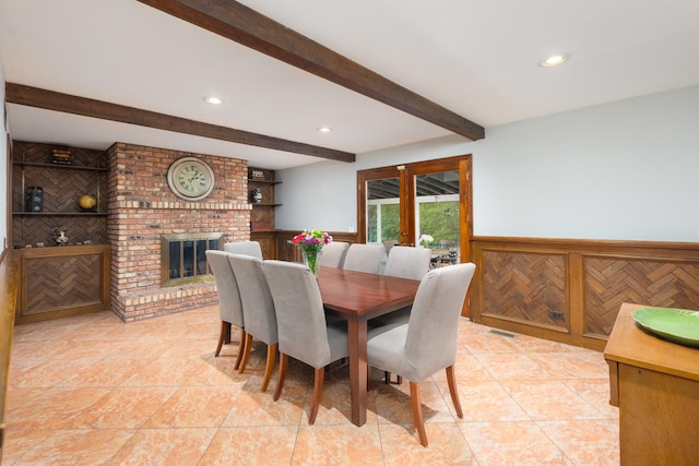 1386 Old Dominion Ct, Naperville, IL 60540 - dining room with beam ceiling, a wainscoted wall, a fireplace, recessed lighting, and light tile patterned floors
