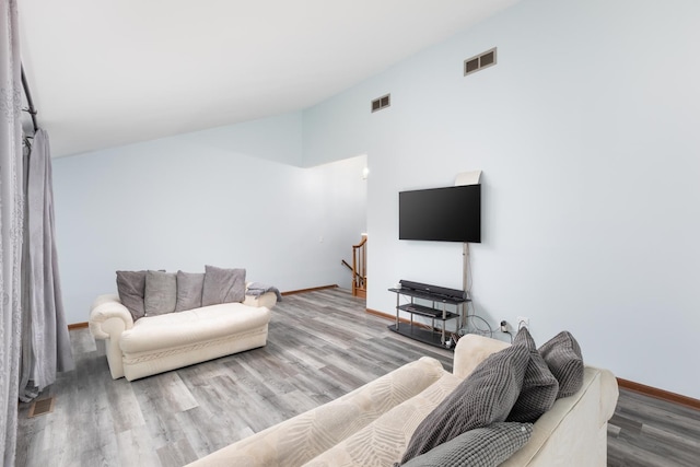 1386 Old Dominion Ct, Naperville, IL 60540 - living room featuring wood finished floors and lofted ceiling