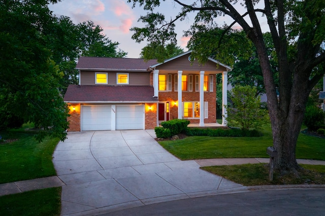 1386 Old Dominion Ct, Naperville, IL 60540 - greek revival inspired property featuring concrete driveway, brick siding, a front lawn, and a garage