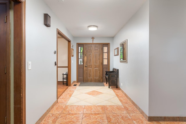 1386 Old Dominion Ct, Naperville, IL 60540 - foyer entrance featuring light tile patterned flooring and baseboards