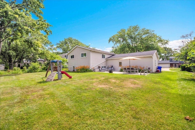 1259 Durham Dr, Wheaton, IL 60189 - back of property with a playground, a lawn, and a patio