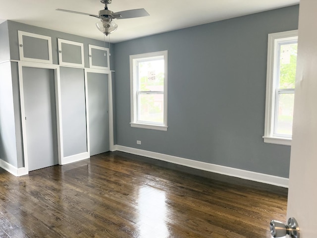 8517 S Wallace St, Chicago, IL 60620 - unfurnished bedroom with baseboards and dark wood-type flooring