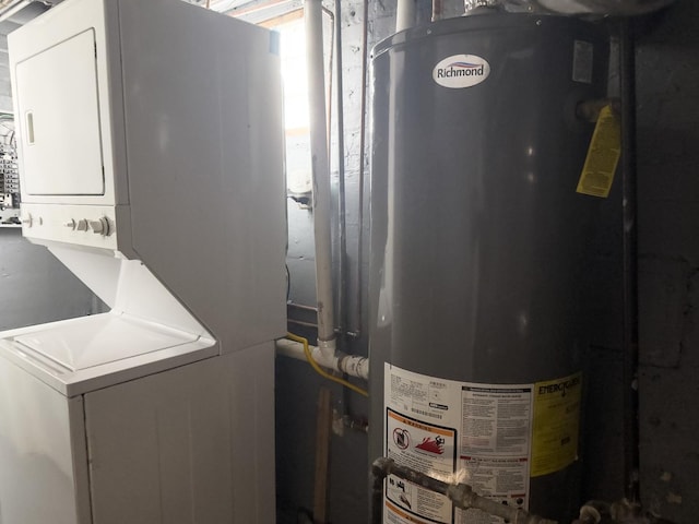 8517 S Wallace St, Chicago, IL 60620 - laundry room featuring water heater and stacked washer / drying machine