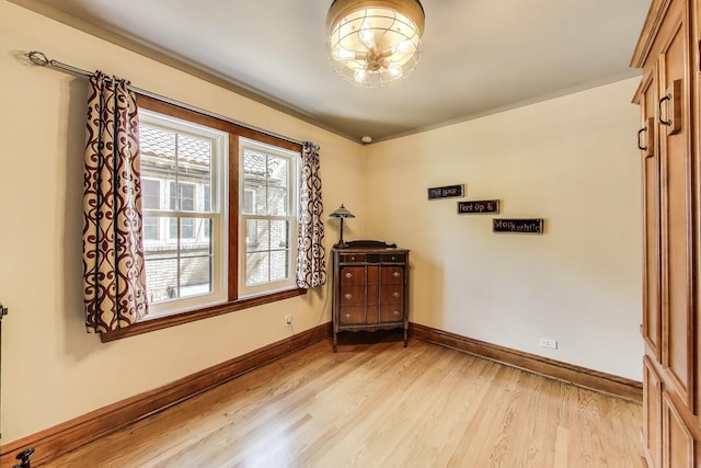 210 Berry Pkwy, Park Ridge, IL 60068 - spare room featuring light wood-type flooring and baseboards