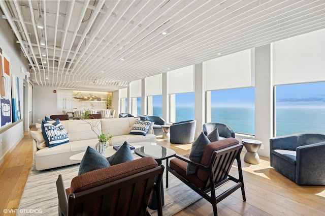 1110 N Lake Shore Dr Unit 20S, Chicago, IL 60611 - living area with light wood finished floors and a water view