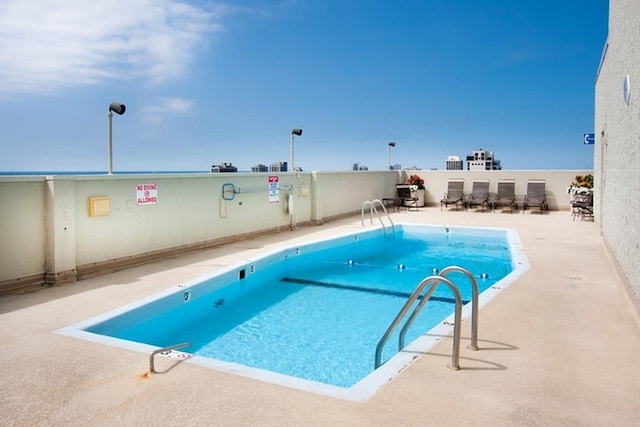 1110 N Lake Shore Dr Unit 20S, Chicago, IL 60611 - community pool featuring a patio area