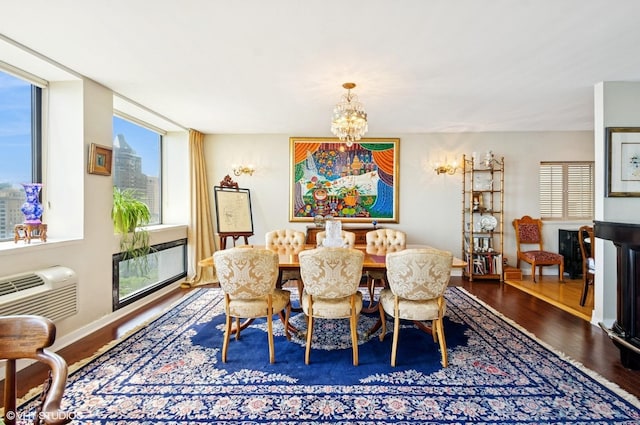 1110 N Lake Shore Dr Unit 20S, Chicago, IL 60611 - dining room with wood finished floors, a chandelier, and an AC wall unit
