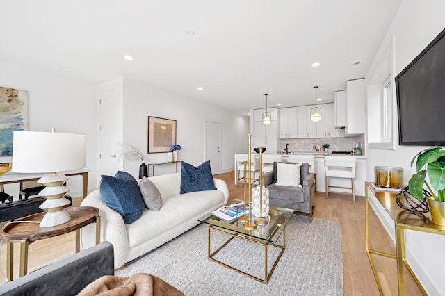 1352 W Diversey Pkwy Unit 2, Chicago, IL 60614 - living area with light wood finished floors and recessed lighting