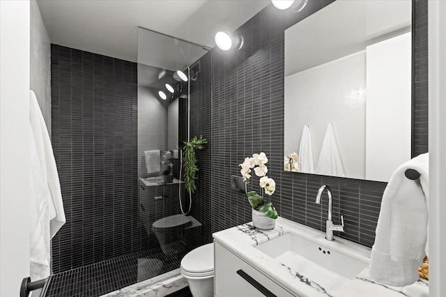 910 N Lake Shore Dr Unit 1615, Chicago, IL 60611 - full bathroom featuring vanity, tile walls, walk in shower, and backsplash