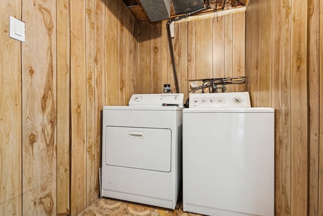 3551 Marseilles Ln, Hazel Crest, IL 60429 - laundry area featuring washing machine and clothes dryer and wooden walls
