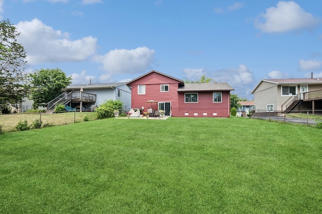 3551 Marseilles Ln, Hazel Crest, IL 60429 - back of house with stairs and a fenced backyard